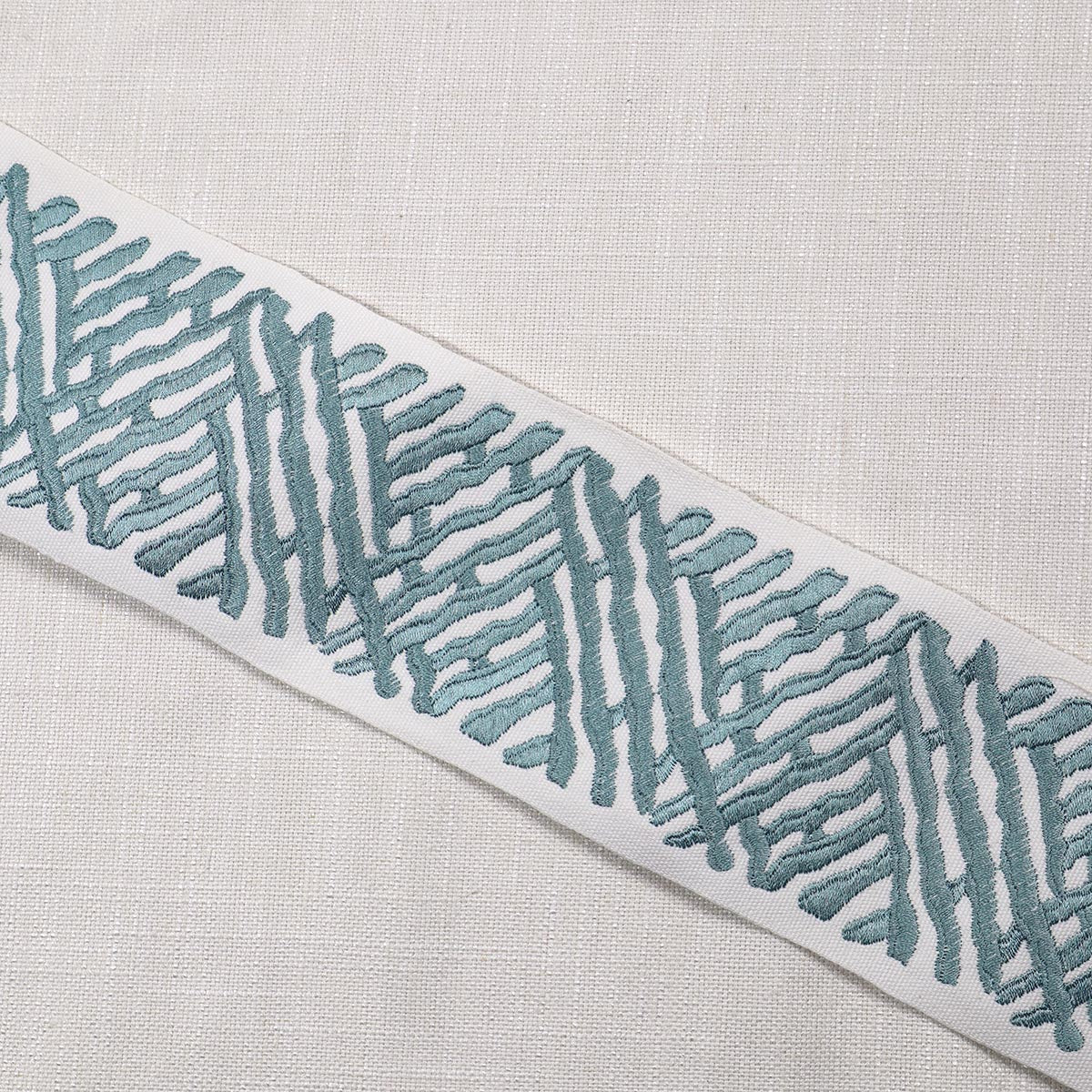 Purchase Mag Fabric Item# 11457 pattern name Trelli Emb Tape Jade