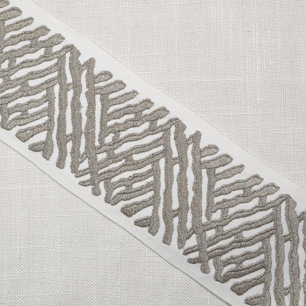 Purchase Mag Fabric Item 11460 pattern name Trelli Emb Tape Platinum