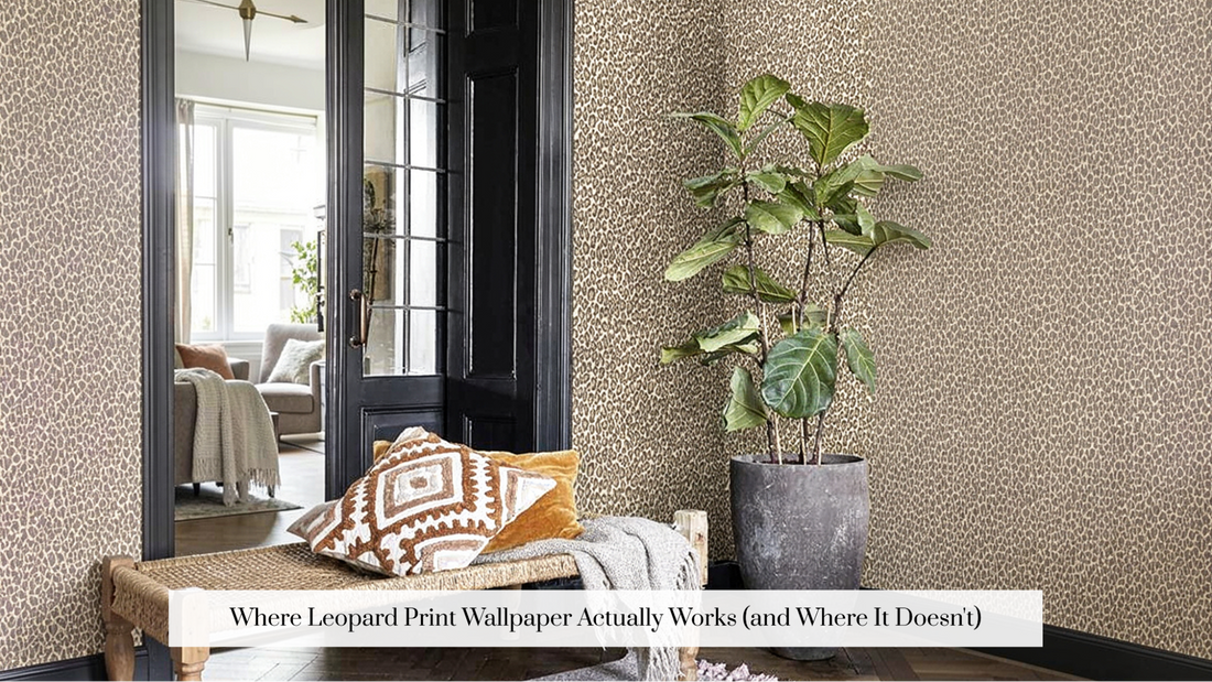 Leopard print wallpaper accent wall in a powder room