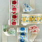 Purchase 78590 | Mila Hand Block Print Tape, Red - Schumacher Trim