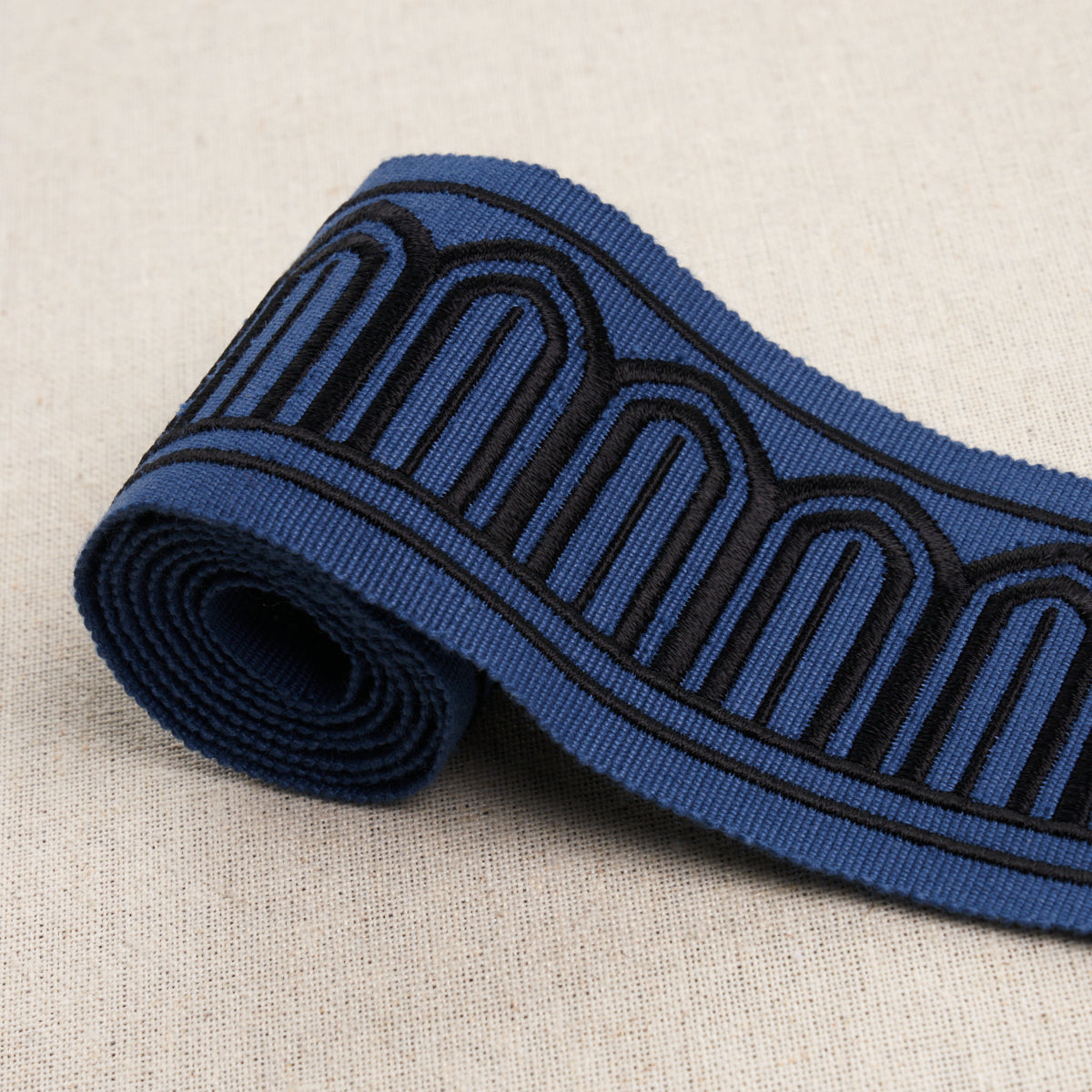 Purchase 81150 | Arches Embroidered Tape Medium, Black On Navy - Schumacher Trim