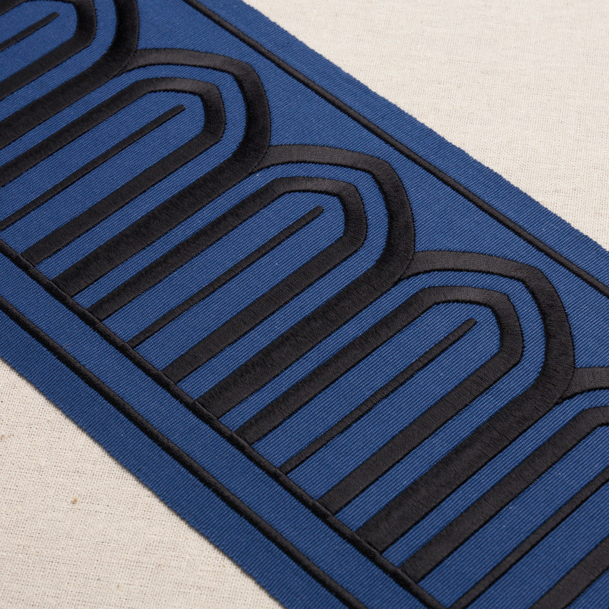 Purchase 81160 | Arches Embroidered Tape Wide, Black On Navy - Schumacher Trim