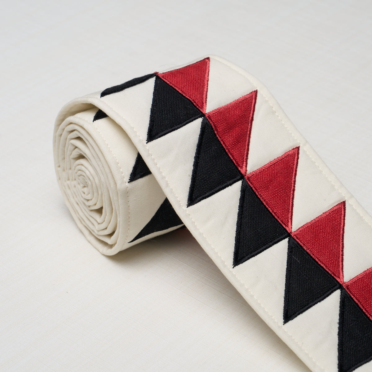 Purchase 87582 | Quilted Diamond Tape, Black & Red - Schumacher Trim