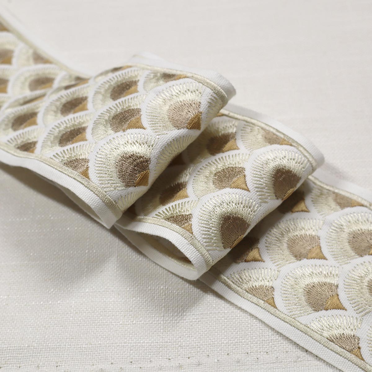 Purchase Mag Fabric SKU# 11467 pattern name Fanny Emb Tape Quartz