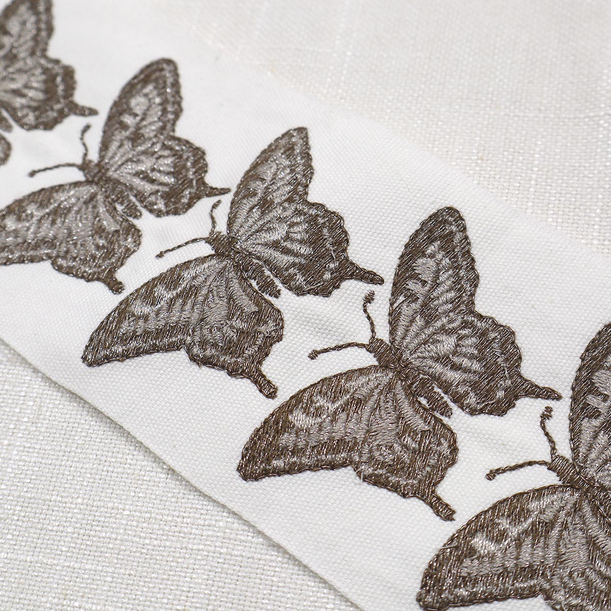 Purchase Mag Fabric SKU 11461 pattern name Flutter Emb Tape Nickel